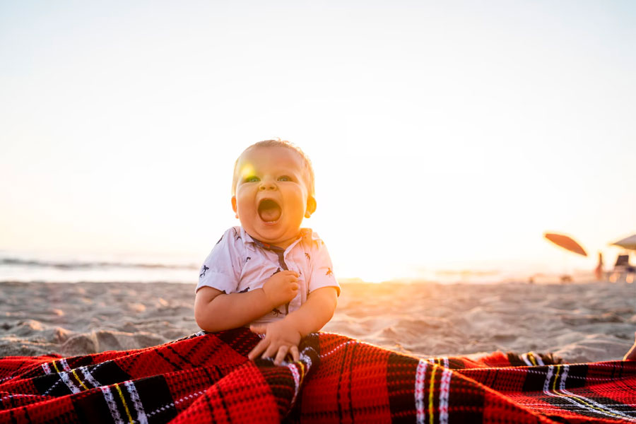 baby with picnic blanket